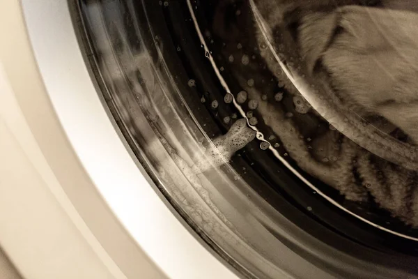 Doing laundry in laundry room