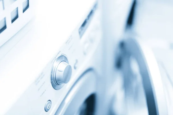 Doing laundry in laundry room — Stock Photo, Image