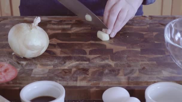 Mincing Yellow Organic Onions Wood Cutting Board — Stock Video