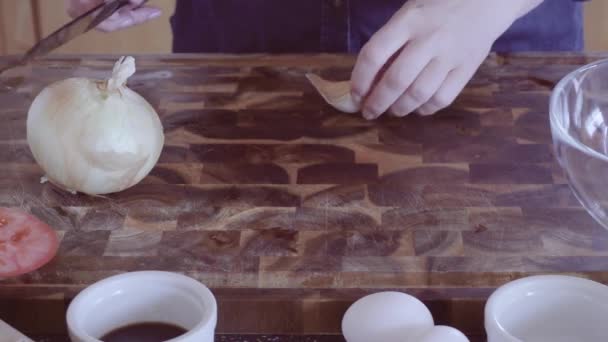 Mincing Yellow Organic Onions Wood Cutting Board — Stock Video