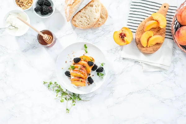 Peach ricotta toast