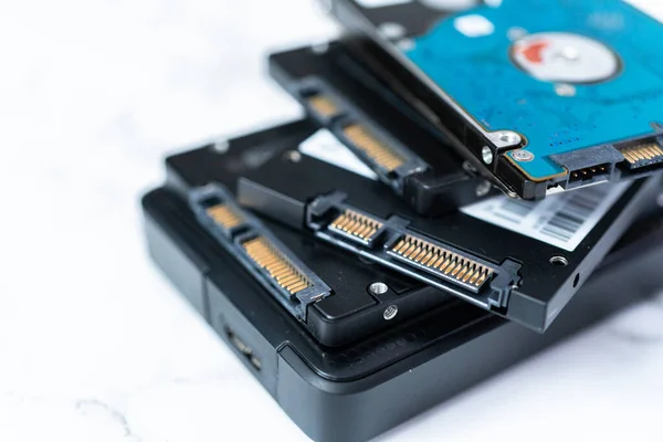 Internal and external solid state hard drives on the table.