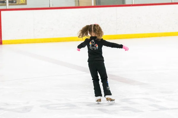Little Girl Practicing Figure Skating Moves Indoor Ice Rink — Stock Photo, Image
