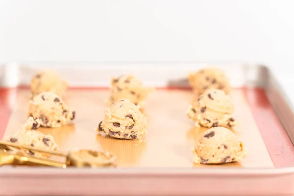 Homemade Chocolate Chip Cookies Dough Scoops Baking Sheet Silicone Mat — Stock Photo, Image