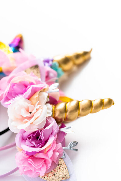 Variety of unicorn headbands on a white background.