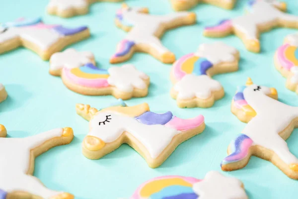 Unicorn Sugar Cookies Decorated Royal Icing Food Glitter Blue Background — Stock Photo, Image