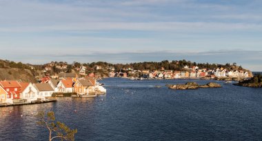 Gjeving in Tvedestrand, Norway - January 30, 2018: The small village of Gjeving in Tvedestrand, along the southern coast of Norway clipart