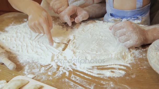 Family cook. Mother and daughter making pie together — Stock Video