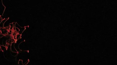 Siyah bir arka plan, kırmızı mürekkep su soyut kırmızı parçacıklar