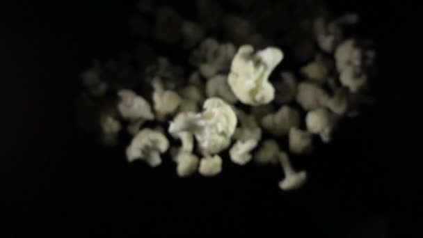 Cauliflower falls in the air on a black background. slow motion. — Stock Video