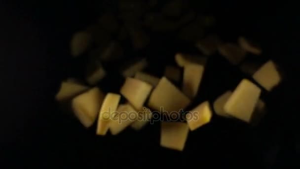 The pumpkin falls into the air on a black background. Slow motion. — Stock Video