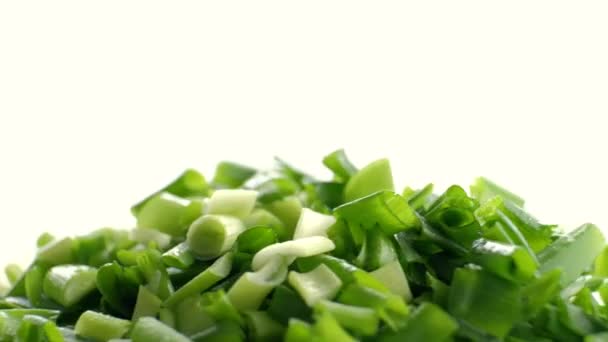 Green onions on a white background — Stock Video