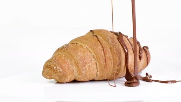 Croissants with chocolate on a white background — Wideo stockowe