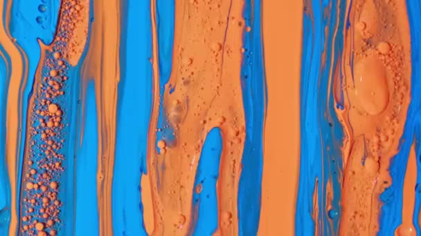 Colorful static footage. Blue and red paint dissolve in a solvent. Can be used as a background — Stock Video