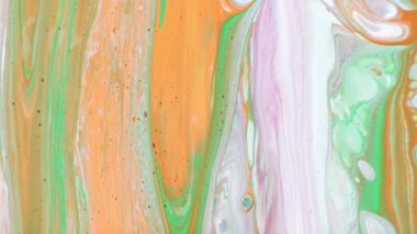 Soyut psikedelik arka plan. Renkli boyalar sütte yavaşça desenlere dökülür.