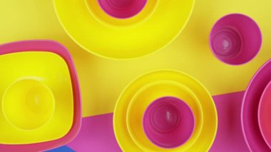 Pink Yellow colorful plastic water bowls texture background