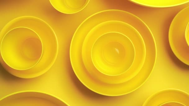 Abstract yellow plastic bowls layers background — Stock Video