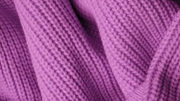 背景にピンクの編み物のファブリック。マクロ — ストック動画