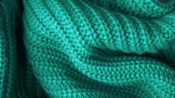 Detailní záběr na tyrkysovou pletenou vlněnou texturu, pozadí — Stock video