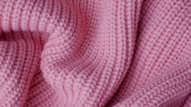 arka plan olarak pembe örme kumaş. Makro
