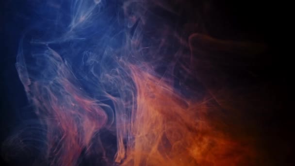 Red fire versus blue ice smoke dynamic abstract background — Stock Video