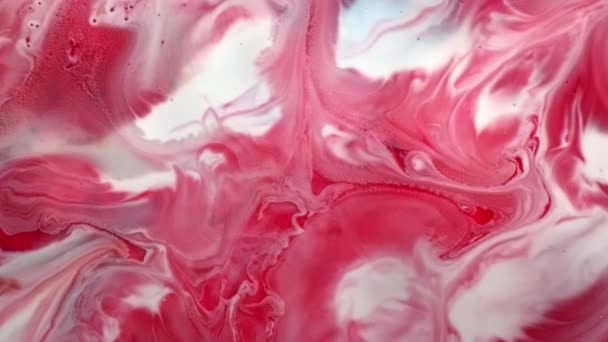 红、白抽象油膜表面喷溅化学反应 — 图库视频影像