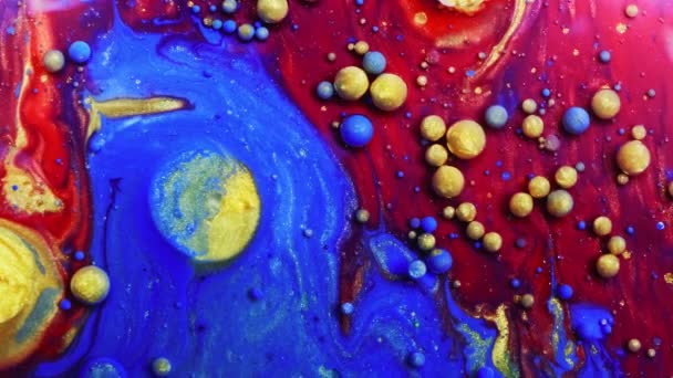 Multicolored Bubbles Of Bright Collors Moving In Paint Oil Surface Beautiful Blue Universe Of Color Slow Motion Macro Red Blue Black And Yellow — Stock Video