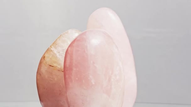 Beautiful uncut rose quartz gemstone,motion black background — Stock Video