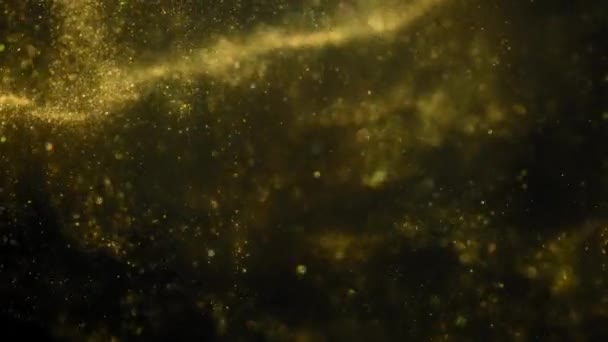 Partículas de oro bokeh brillo otorga polvo fondo abstracto — Vídeo de stock