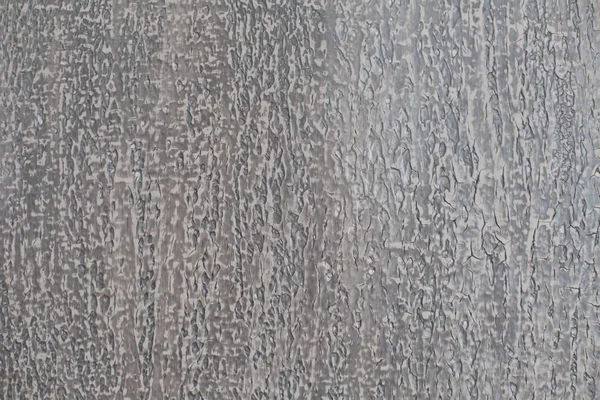 Die rissige Textur von grauer Farbe. Ausbauarbeiten — Stockfoto