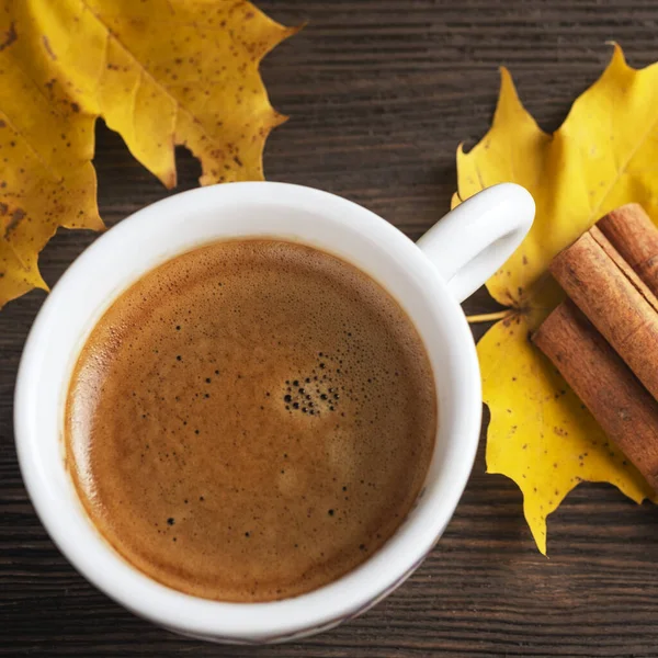 Autumn coffee cup. Closeup. Top view.