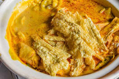 Çince balık köri çorbası, Mappas kral balık köri ile Hindistan cevizi mil