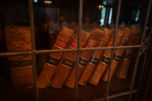 TORONTO, CANADA - 06 20 2016: Antique volumes Canada Supreme Court Reports in the exposition of Casa Loma, famous museum in a Gothic Revival castle built in 1914 at the centre of Toronto city. — Stock Photo, Image