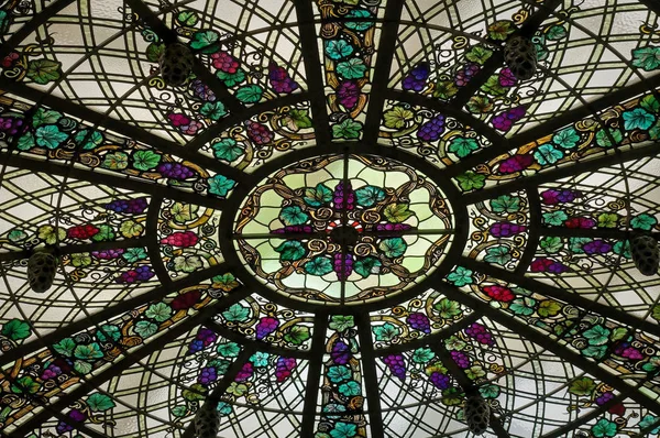 TORONTO, CANADA - 06 20 2016: Part of stained-glass dome of Casa Loma Conservatory. This stunning stained-glass ceiling with the grapevine theme was designed by the Robert McCausland Studio in Toronto