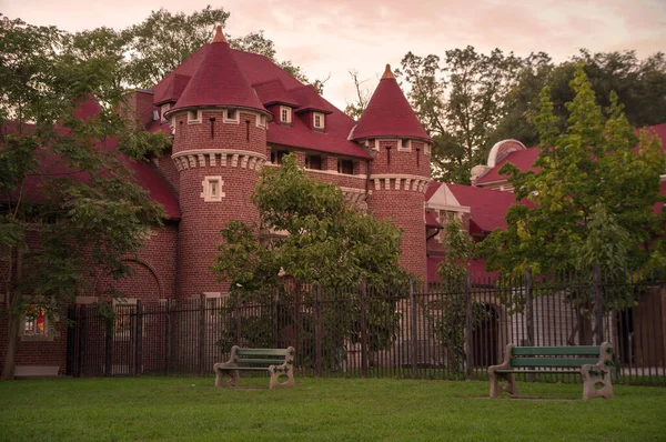 TORONTO, CANADA - 10 09 2018: Casa Loma Stables building under the sunset sky. Casa Loma is a Gothic Revival castle-like building that has become one of the most famous landmarks of Toronto, major — Stock Photo, Image