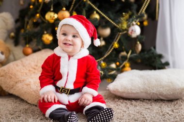 komik bebek çocuk sahte altın Noel top ile Santa şapka