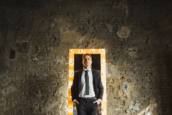 Young businessmen in black suit emotional posing — Stock Photo, Image