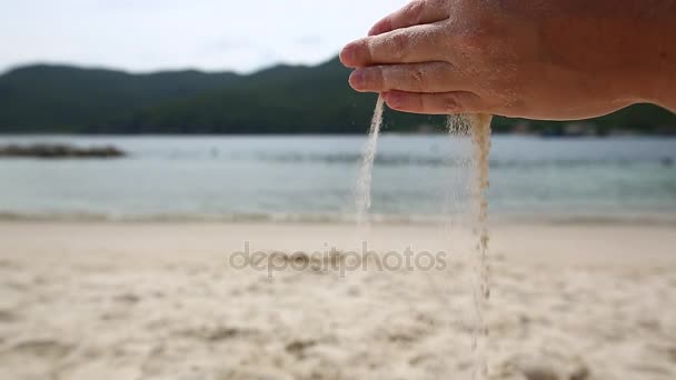 Female playing with white sand on exotic beach — Stock Video