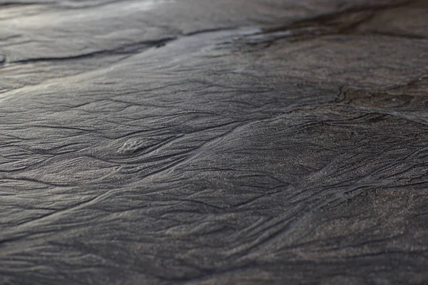 Närbild svart grov sandpapper ark textur användning som bakgrund — Stockfoto