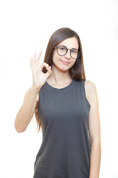 Woman with okay gesture isolated over white background — Stock Photo, Image