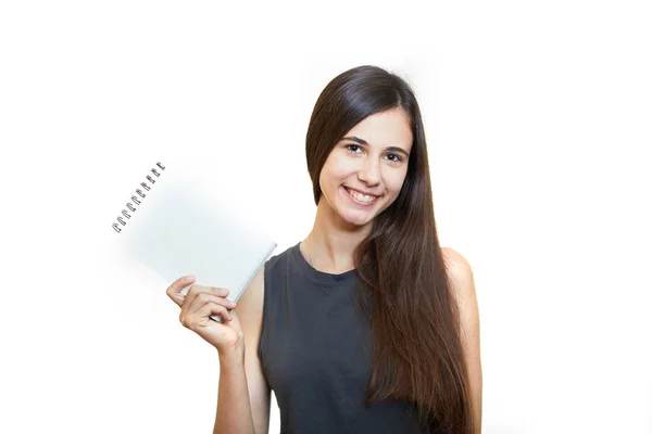 Mulher segurando lápis com notebook e olhando para cima isolado em um — Fotografia de Stock