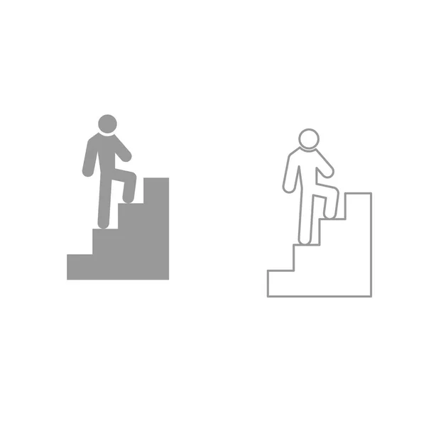 Un hombre subiendo escaleras es un icono negro  . — Archivo Imágenes Vectoriales