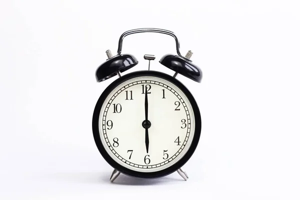 Beyaz arkaplanda klasik tablo saati. 