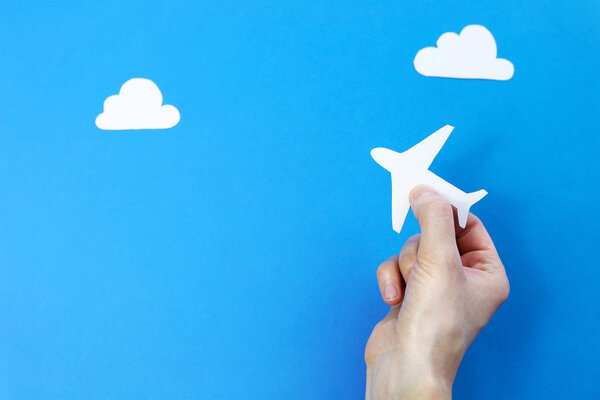 paper airplane in hands 