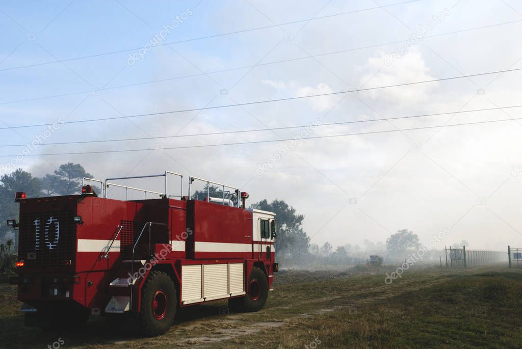 NASA Fire Rescue Services are on the scene to support a controlled burn in the vicinity of the Industrial Area at NASA's Kennedy Space Center in Florida. elements of this image furnished by nasa
