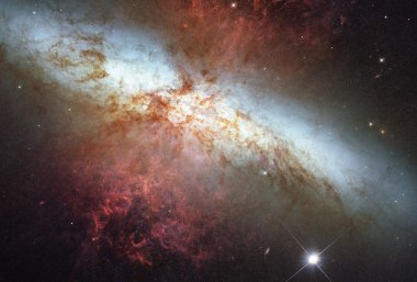 Hubble Monitors Supernova In Nearby Galaxy M82. elements of this image furnished by nasa clipart