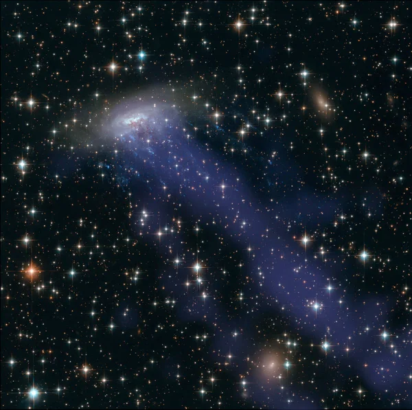 NASA's Hubble Finds Life is Too Fast, Too Furious for This Runaway Galaxy. elements of this image furnished by nasa