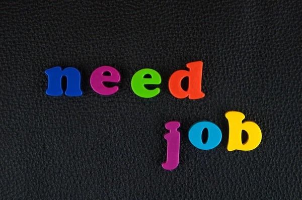 Need Job Written Mix Colourful Plastic Letters Black Leather — Stock Photo, Image