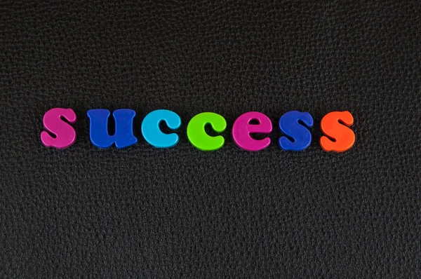Success Written Mix Colourful Plastic Letters Black Leather — Stock Photo, Image