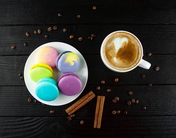 Tasty Colourful Macaroons Plate Pieces Cinnamon Cup Coffee Black Wooden — Stock Photo, Image